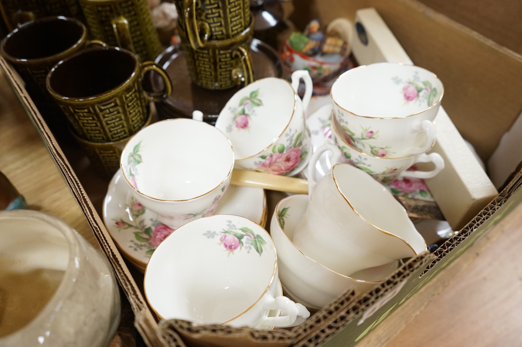 A collection of ceramics to include Doulton Toby jugs, Goebel figurines and Adderley part tea set